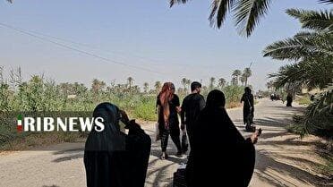 پیاده روی زائران اربعین از کنار نهر فرات