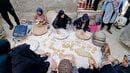 سنت ۴۵ ساله پخت نان شیرمال نذری در محله کنجدجان گلشهر