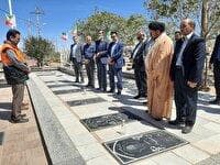 به مناسبت هفته دولت گلزار شهدای شهر نسر غبارروبی شد