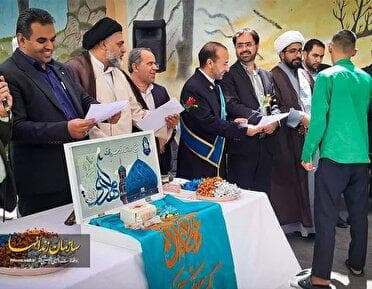 آزادی ۱۲ زندانی در زرند با حضور پرچم متبرک مسجد مقدس جمکران