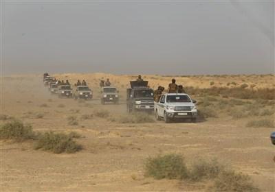 رزمایش حشد الشعبی در نزدیک مرز با سوریه