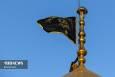 آیین تعویض پرچم گنبد حرم مطهر حضرت معصومه(س)