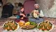 پخت غذای محلی افغان با ماهی در روستای دورافتاده (فیلم)