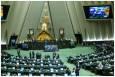 تجلیل از کشتی‌گیران و اهدای پیراهن تیم ملی به قالیباف در صحن مجلس