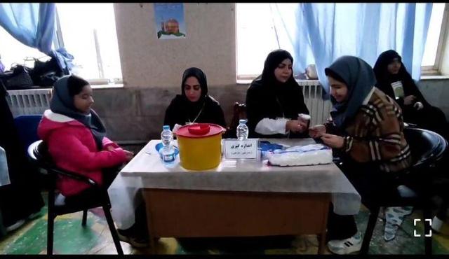ویزیت رایگان کانون سلامت خدمت رضوی در مدارس رشت