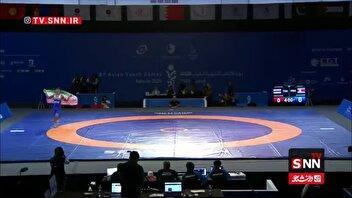 دور افتخار پارسا طهماسبی با پرچم ایران پس از کسب اولین طلای کشتی ایران را دشت کرد