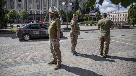 Ukrainian draft enforcers snatch teacher in front of students (VIDEO)