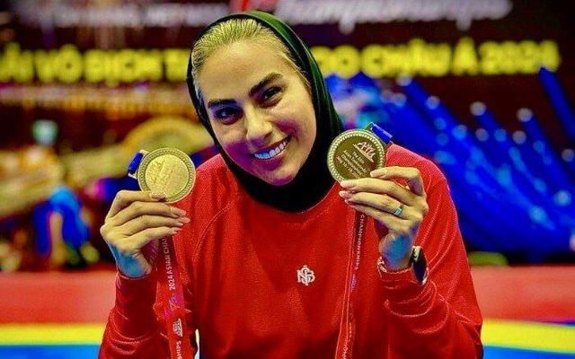 عکس | لاکی به رنگ پرچم ایران همراه با سلام نظامی خواهر هادی ساعی