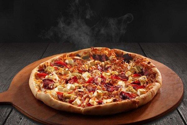 چگونه یک پیتزای خوشمزه مانند رستوران در خانه درست کنیم؟