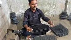 مراحل ساخت قفس پرنده در کارگاه‌های سنتی پاکستان (فیلم)