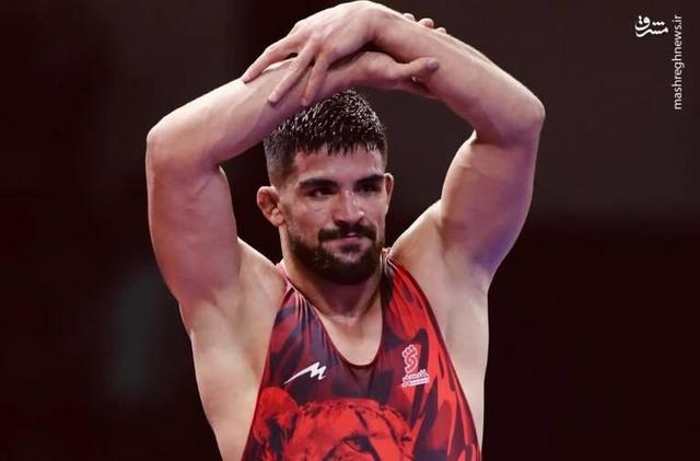 پیامی که یک کشتی گیر ایرانی با دستانش فرستاد!