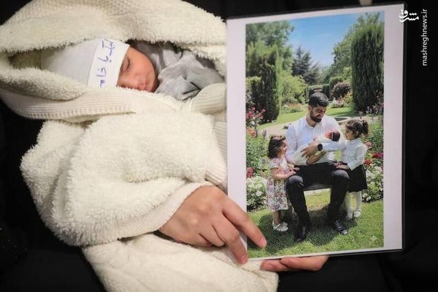 ماجرای یک عکس دردناک از نوزاد در آغوش پدر شهیدش