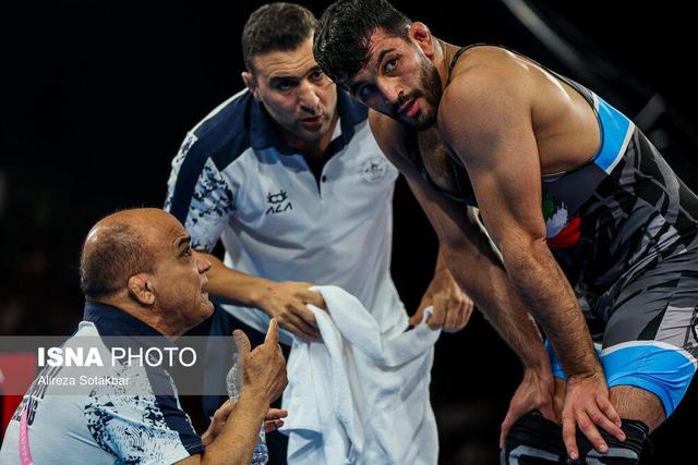 حضور همزمان احسان امینی در کشتی آزاد جوانان و بزرگسالان