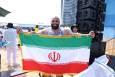 عجمی پرچمدار کاروان شهدای ناو دنا در مراسم اختتامیه بازی‌های ساحلی