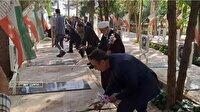 عطر افشانی قبور شهدا در شاهین شهر