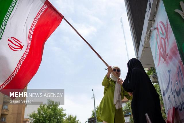 پویش «این پرچم زمین نمی‌ماند» در همدان