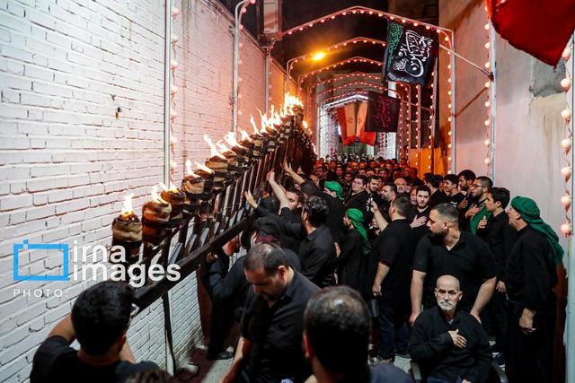 آئین مشعل‌گردانی نجفی های مقیم مشهد
