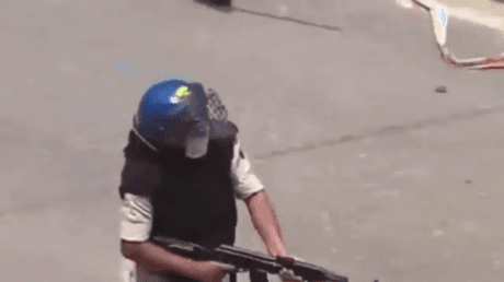 Indian cop who fired AK-47 at students suspended