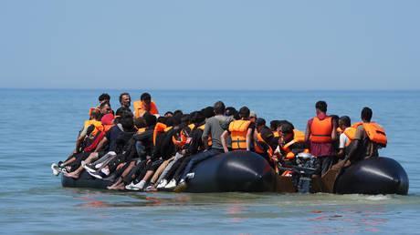 ‘Our order is to let them go’ – French police on migrants crossing to UK (VIDEO)