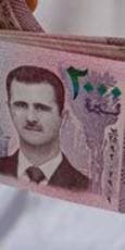 برنامه سوریه : حذف ۲ صفر از پول ملی / حذف عکس بشار اسد از اسکناس