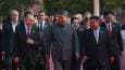 Xi, Putin, and Kim joke about living to 150 in hot-mic chat