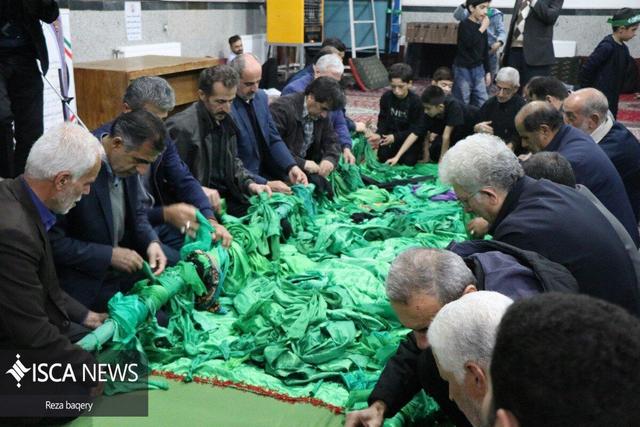 آیین علمبرچینی اشکوریهای الوند در سوگ حضرت زهرا(س) برگزار شد